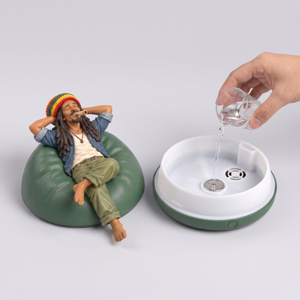 Lift the top off and pour water into the tank